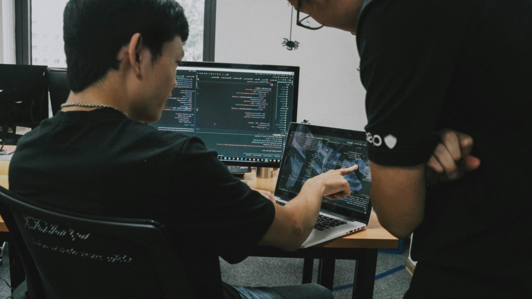 Students working on 3D modeling projects in computer lab